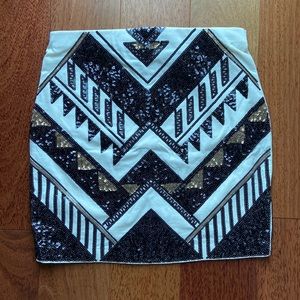Express sequined mini skirt in western print
